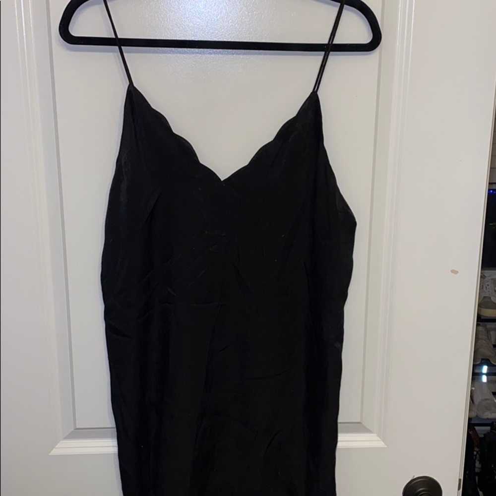 Short black dress with scallop details